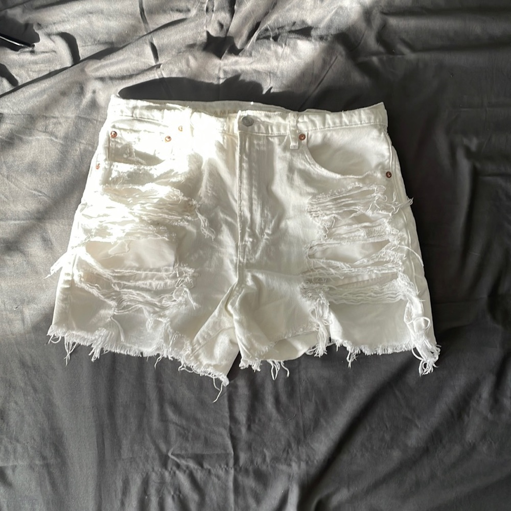 White ripped short jeans